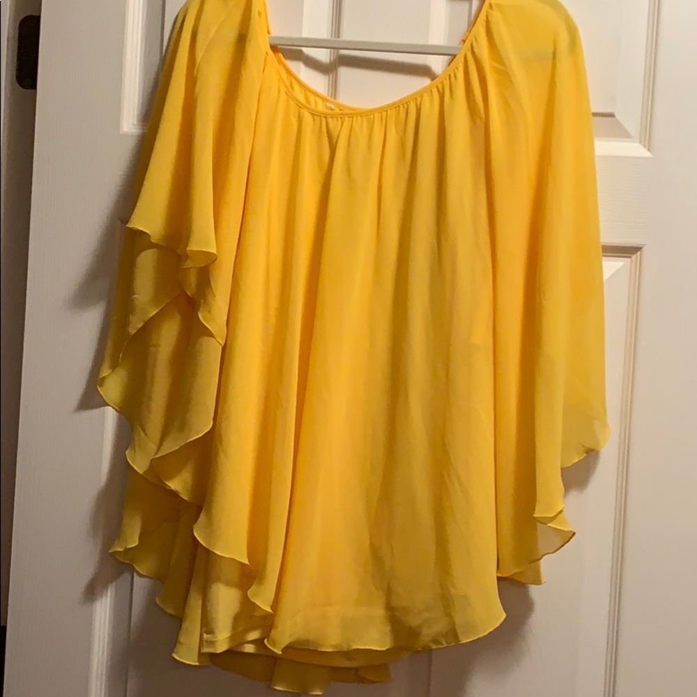 Bright yellow flowing plus size top